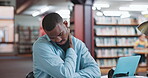 Shoulder pain, university or black man in library with laptop, tired or frustration for research paper. Space, tech or student in college with muscle strain, overworked or stress in online education.