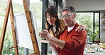 Artist, man and painting for creative art, inspiration or design process for project in home. Brush, canvas and mature couple with woman for hobby, color or sketch with talent for craft in house