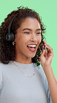 Customer service, woman and headset on green screen for support, advice and contact us. Help desk, agent and call center tech on chromakey for communication, friendly assistance and telecommunication