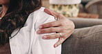 Love, hands and couple with affection on sofa for bonding together, romance and healthy relationship. Relax, people and touch in house for connection, marriage commitment and appreciation on weekend