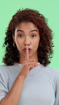 Face, silence and woman on green screen for secret, privacy and confidential in studio. Portrait, quiet and model with finger on lips for shush sign, gesture or whisper emoji for gossip on background