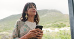 Woman, phone and thinking on balcony for social media with holiday, vacation and morning message Typing, hospitality and person outdoor for relax, smile and online review for travel and accommodation