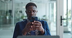 Phone, typing and black man in office on break with networking, chatting or social media. Technology, research and African business manager on cellphone for communication on mobile app in workplace.