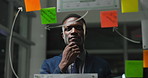 Night, thinking and black man with glass wall for business schedule, insurance policy or point. Office, brainstorming strategy and broker with board for coverage, reading notes or idea on deadline