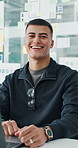 Face, business and man with laptop, smile and career ambition with product development. Happy person, employee and design agency with pride, confidence and computer with positive mindset in office
