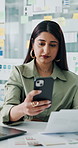 Documents, woman and typing with phone in office for site layout, template review and planning. Web designer, employee and smartphone with paperwork at desk for prototype framework or app development