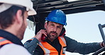 Construction site, operator and men in forklift, talking and collaboration for property development. Engineer, discussion and person in vehicle for architecture, inspection and equipment or machinery