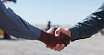 Shaking hands, logistics and deal port with shipping, agreement and onboarding for commerce. People, handshake and hiring with recruitment, thanks or supply chain management at distribution plant