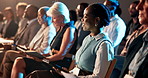 Audience, conference and tablet with business woman in auditorium for development seminar. App, crowd and presentation with group of employee people in convention center for corporate tradeshow