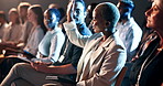 Audience, tablet and question with business woman in auditorium for development seminar. App, hand raised and presentation with group of employee people in convention center for corporate tradeshow