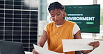 Creative, black woman and documents with laptop in office to prepare for environment presentation. Person, paperwork and pc with sustainable report, climate change awareness and eco-friendly proposal