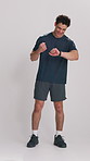Fist pump, exercise and man with smart watch in studio for workout goals, performance and training. Happy, excited and athlete with tech for tracking fitness, wellness and health on white background