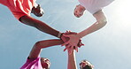 Fitness, team and hands together with people outdoor for training, support and collaboration. Running club, applause and workout partners with low angle of runner on blue sky for connection and goal