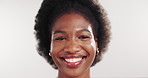 Face, smile and black woman in studio, makeup and dermatology on white background. Space, shine and African person with confidence, wellness and healthy skin with cosmetics, glow and aesthetic
