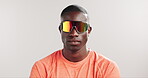 Fitness, man and photochromic sunglasses in studio for UV protection, exercise comfort and aesthetic. Mockup space, black man or serious with transition lenses on white background for workout eyewear