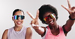 Fitness, friends and women in studio with sunglasses for workout, training and exercise. Mockup space, sports and happy people with peace sign for wellness, health and bonding on white background