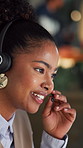 Happy woman, agent or night with headset in office for online communication or advice. Female person, consultant or working late with mic for virtual assistance, help or customer service in workplace