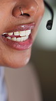 Woman, mouth and consultant with headset for online advice, CRM or customer service in office. Closeup, female person or friendly agent with smile or mic for virtual assistance, help or web support