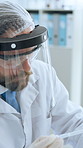 Lab, scientist and man with pipette, observation and medical research for drug development and cure. Pharmaceutical, biotech and person with face shield for protection, test and process for medicine