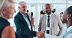 Business people, handshake and greeting in seminar, introduction and discussion at global convention. Shaking hands, collaboration and agreement or meeting at conference, welcome and b2b thank you