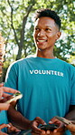 Volunteer group, man or phone at park with laughing, charity event update or funny NGO notification. Non profit organization, smartphone and happy with online coordination and community service chat