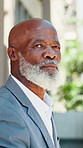 Thinking, outdoor and mature black man in city for planning with finance career development. Decision, ideas and African male financial manager with choice or brainstorming for job growth in town.