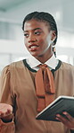 Woman, talking and meeting in design agency with tablet, fashion planning or trend forecast. Black person, smile or speaking in office with tech for merchandise strategy, market research or feedback.