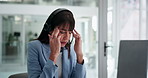 Woman, headache and headset at office, laptop and fatigue with consulting at investment company. Person, financial advisor and broker with migraine, stress or burnout with voip microphone at agency