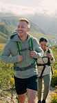 Happy couple, hiking and trekking on mountain for adventure date, connection and bonding together. People, walking and explore in nature with backpack for travel, wellness and healthy relationship.