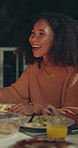 Night, dinner and woman with smile, discussion and social gathering with humor. Funny, evening and person with healthy meal, nutrition and talking with food, celebration and conversation with event