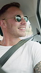 Man, driving and laugh in car for road trip, sunglasses and happy for travel, sightseeing or journey. Person, excited and tourism with smile for ride, transportation and memory in vehicle on vacation