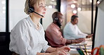 Night, call center and woman in office, computer and talking with customer support. Evening, people and employee in workplace, pc and help desk with communication, conversation and consultation