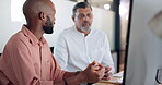 Men, meeting and mentor with computer in office for training, review article and copywriting advice. People, manager and talk with pc for guidance, coaching intern and feedback on story publication