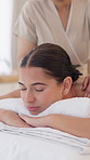 Woman, relax and massage back at spa for stress relief, muscle healing and luxury skincare. Person, masseuse and pamper with body therapy, tension treatment and soothing session for customer wellness