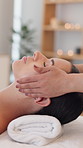 Hands, facial massage and woman in salon for beauty, skincare and holistic wellness with peace. Health, masseuse and face treatment in spa for luxury therapy, dermatology and relax with bokeh