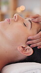 Spa, woman and head massage on bed in hotel for wellness, luxury facial treatment and hospitality. Bokeh, person relax and masseuse in retreat center for stress relief, body care or physical therapy.