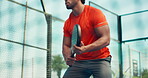 Tennis racket, sport and net with man on court for game, competition training and fitness. Contest challenge, workout and arena with low angle of padel player for athlete, turf and club tournament