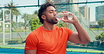 Fitness, rest and Indian man in court drinking water hydration and break in training routine. Refresh, exercise and athlete outdoor with bottle, h20 liquid and health detox in workout recovery.