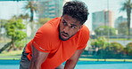 Fitness, tired or Indian man in court with breathing, cardio rest or break in intense practice. Exercise, exhausted or athlete outdoor with fatigue, ambition or workout recovery in performance goal.