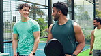 Conversation, padel and walking with friends outdoor together for exercise or training session. Fitness, sports and talking with group of people on court for practice, team building or workout