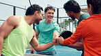 Fist bump, support and padel with people on court for teamwork, tournament mission and goal. Tennis player, training motivation and partnership with friends for target, competition and solidarity