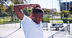 Black man, tennis player or stretching with preparation on court for workout, sport or exercise. Active, male person or athlete getting ready with arm warm up or breathing for outdoor game or match