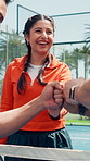 Fist bump, tennis and woman with fitness, smile and teamwork with motivation, event and contest. People, gesture and group with friendly match, sports game and tournament with challenge and practice