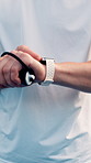 Athlete, hands and smart watch for padel, fitness app and monitor heart rate from competition. Man, person and wristwatch to track training, match timer and sports progress for tennis tournament