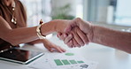 Business people, documents or meeting with handshake for partnership, deal or agreement in office. Closeup, employees or shaking hands with paperwork, graph or tablet for hiring, b2b or collaboration