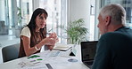 Discussion, documents and business people in office with negotiation, statistics or data on finance. Meeting, charts and financial manager with client for investment pitch with paperwork in workplace