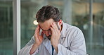 Man, doctor or headache with stress for pressure, overworked or mental health in hospital. Frustrated, male person or healthcare surgeon with anxiety, fatigue or migraine for burnout, fail or mistake