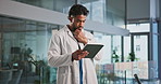 Tablet, doctor thinking and man in hospital for healthcare, planning report or contemplating. Technology, problem solving and serious medical worker with telehealth, insurance insight or evaluation