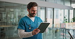 Healthcare, man and nurse in hospital with tablet, report and reading for illness and wellness. Smile, medical service and person in lobby for clinical trial, technology or schedule for information