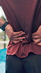 Hands, back pain and man on tennis court with injury, joint inflammation or training accident. Sports, health and padel player with sore spine, massage or athlete with muscle tension for outdoor game